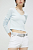 foto джинсові шорти tommy jeans жіночі колір білий однотонні середня посадка