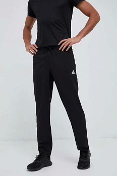 foto штани для тренувань adidas essentials stanford колір чорний з аплікацією